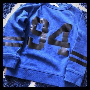 Sweater with faux leather